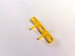 Nárazník Mercedes Unimog žlutý 